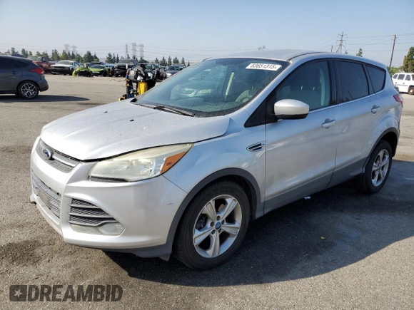 2013 Ford Escape SE with VIN 1FMCU9G91DUA14350, listed as a Copart auction lot 63651315 with 165,414 mi miles and Salvage title. Bid and sale history available at DreamBid. Image 1.