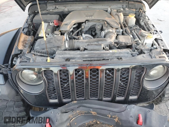 2020 Jeep Gladiator Rubicon z VIN 1C6JJTBG5LL101185, wystawiony jako Copart lot #83012014 z przebiegiem Nie podano mil oraz Nie do naprawy • Non repairable. Historia ofert i sprzedaży dostępna na DreamBid. Obrazek 12.
