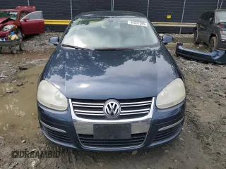 2005 Volkswagen Jetta 2.5L with VIN 3VWRG71K45M628981, listed as a Copart auction lot 58531595 with 128,217 mi miles and Salvage title. Bid and sale history available at DreamBid. Image 5.