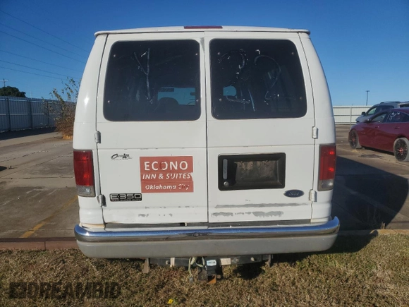 2002 Ford Econoline Passenger XL with VIN 1FBSS31S82HB36096, listed as a Copart auction lot 80654574 with 170,656 mi miles and Salvage title. Bid and sale history available at DreamBid. Image 6.