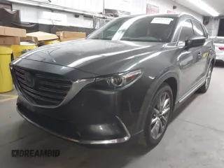 2017 Mazda CX-9 Grand Touring z VIN JM3TCADY2H0134070, wystawiony jako IAAI lot #41611243 z przebiegiem 87 046 mil mil oraz . Historia ofert i sprzedaży dostępna na DreamBid. Obrazek 17.