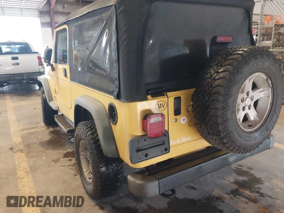 2005 Jeep Wrangler Unlimited with VIN 1J4FA44S95P373346, listed as a IAAI auction lot 41707821 with 175,865 mi miles. Bid and sale history available at carsss.com. Image 3.