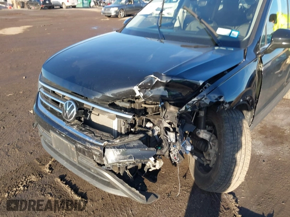 2023 Volkswagen Tiguan SE with VIN 3VVMB7AX8PM032557, listed as a IAAI auction lot 41585975 with 28,706 mi miles and . Bid and sale history available at DreamBid. Image 6.