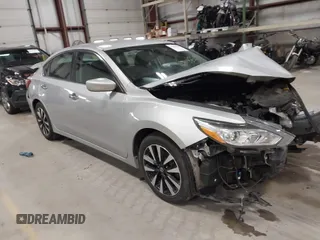 2018 Nissan Altima SR with VIN 1N4AL3AP0JC266584, listed as a IAAI auction lot 41900484 with 136,223 mi miles and . Bid and sale history available at carsss.com. Image 1.