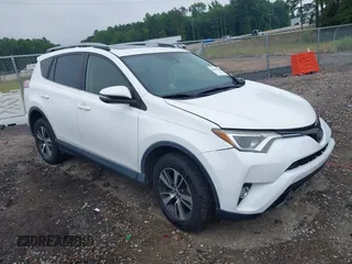 2018 Toyota RAV4 XLE with VIN JTMWFREV2JD115999, listed as a IAAI auction lot 42438320 with 166,876 mi miles and . Bid and sale history available at DreamBid. Image 1.