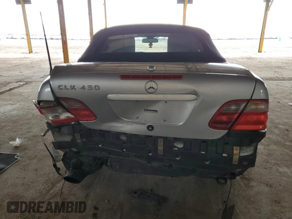 2000 Mercedes-Benz CLK 320/430 z VIN WDBLK70G3YT033094, wystawiony jako Copart lot #49511445 z przebiegiem 193 281 mil mil oraz Szkoda całkowita • Salvage title. Historia ofert i sprzedaży dostępna na DreamBid. Obrazek 6.