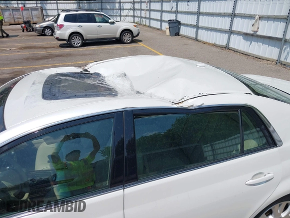 2012 Toyota Avalon with VIN 4T1BK3DB2CU462309, listed as a IAAI auction lot 42665403 with 128,490 mi miles and . Bid and sale history available at DreamBid. Image 6.