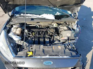 2015 Ford Focus Titanium z VIN 1FADP3N23FL368324, wystawiony jako IAAI lot #41387070 z przebiegiem Nie podano mil oraz . Historia ofert i sprzedaży dostępna na DreamBid. Obrazek 10.