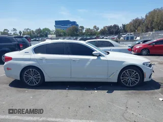2018 BMW 5 Series 530e with VIN WBAJA9C58JB252868, listed as a IAAI auction lot 42323949 with 100,530 mi miles and . Bid and sale history available at DreamBid. Image 13.