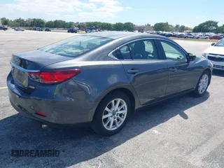 2016 Mazda Mazda6 i Sport with VIN JM1GJ1U5XG1482164, listed as a IAAI auction lot 42052618 with 79,630 mi miles. Bid and sale history available at carsss.com. Image 4.