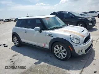 2011 MINI Hardtop S with VIN WMWSV3C53BTY25192, listed as a Copart auction lot 59100785 with Not provided miles and Salvage title. Bid and sale history available at DreamBid. Image 4.