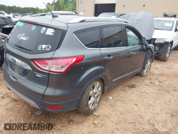 2015 Ford Escape Titanium with VIN 1FMCU9J90FUC14650, listed as a IAAI auction lot 41992858 with 158,963 mi miles and . Bid and sale history available at DreamBid. Image 4.