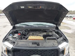 2018 Ford F-150 XL with VIN 1FTEW1EP2JFC58602, listed as a IAAI auction lot 41861045 with 149,399 mi miles. Bid and sale history available at carsss.com. Image 10.