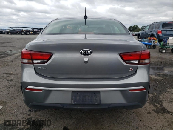 2021 Kia Rio S with VIN 3KPA24AD2ME401151, listed as a Copart auction lot 63223013 with 42,779 mi miles and Salvage Title. Bid and sale history available at DreamBid. Image 6.