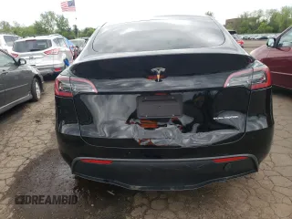 2022 Tesla Model Y Long Range z VIN 7SAYGDEEXNA008898, wystawiony jako Copart lot #54915445 z przebiegiem 35 467 mil mil oraz Szkoda całkowita • Salvage title. Historia ofert i sprzedaży dostępna na DreamBid. Obrazek 6.
