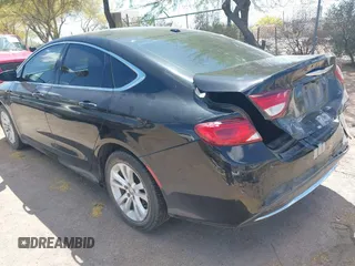 2015 Chrysler 200 Limited with VIN 1C3CCCAB2FN701564, listed as a IAAI auction lot 42068302 with 226,503 mi miles. Bid and sale history available at carsss.com. Image 3.