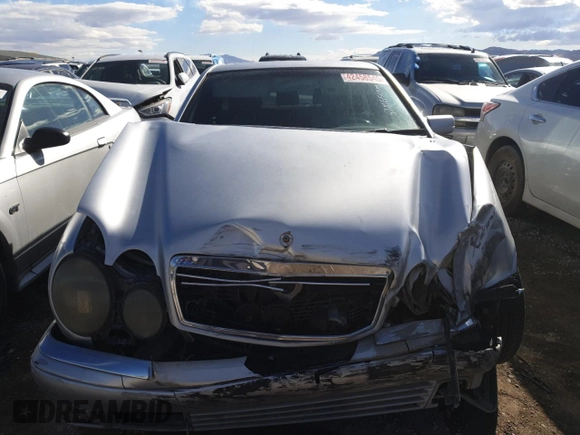 1998 Mercedes-Benz E with VIN WDBJF70F7WA605103, listed as a Copart auction lot 42458545 with 189,082 mi miles and Salvage Title. Bid and sale history available at DreamBid. Image 5.