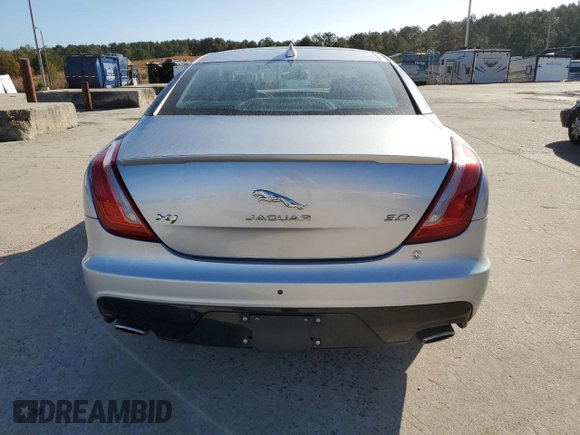2016 Jaguar XJ R-Sport z VIN SAJWA1C77G8V95450, wystawiony jako Copart lot #77933704 z przebiegiem 55 733 mil mil oraz Szkoda całkowita • Salvage title. Historia ofert i sprzedaży dostępna na DreamBid. Obrazek 6.