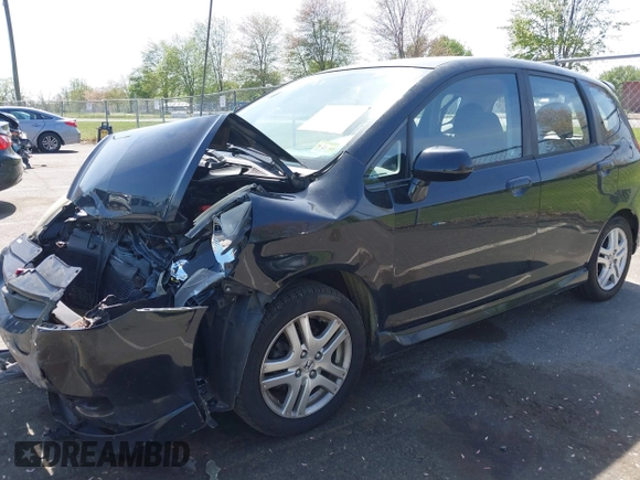 2007 Honda Fit Sport with VIN JHMGD37677S027417, listed as a IAAI auction lot 42155718 with 262,609 mi miles and . Bid and sale history available at DreamBid. Image 17.