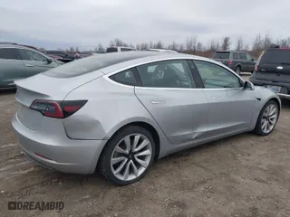 2018 Tesla Model 3 Long Range Battery with VIN 5YJ3E1EBXJF116906, listed as a IAAI auction lot 41913259 with 117,740 mi miles. Bid and sale history available at carsss.com. Image 4.