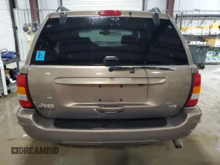 2002 Jeep Grand Cherokee Limited with VIN 1J4GW58NX2C248892, listed as a Copart auction lot 55574615 with 164,010 mi miles and Salvage title. Bid and sale history available at DreamBid. Image 6.