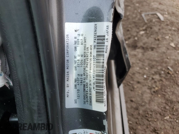 2011 Mazda 3 S Grand Touring z VIN JM1BL1M5XB1433107, wystawiony jako Copart lot #52216955 z przebiegiem 134 509 mil mil oraz Szkoda całkowita • Salvage title. Historia ofert i sprzedaży dostępna na DreamBid. Obrazek 14.