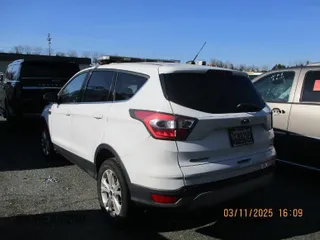 2017 Ford Escape SE with VIN 1FMCU9GD8HUA87094, listed as a IAAI auction lot 41977130 with 82,730 mi miles. Bid and sale history available at carsss.com. Image 1.