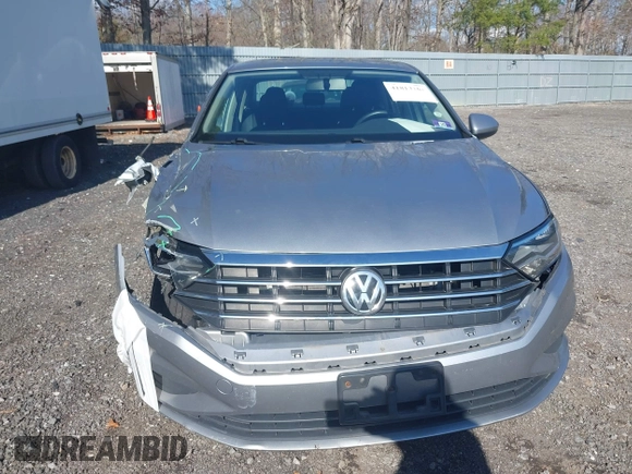 2019 Volkswagen Jetta S z VIN 3VWC57BUXKM242671, wystawiony jako IAAI lot #41813164 z przebiegiem 100 642 mil mil oraz . Historia ofert i sprzedaży dostępna na DreamBid. Obrazek 12.