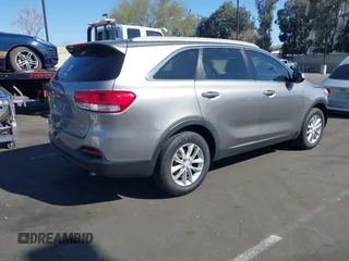 2016 Kia Sorento LX with VIN 5XYPG4A38GG119543, listed as a IAAI auction lot 41630117 with 79,816 mi miles. Bid and sale history available at carsss.com. Image 4.