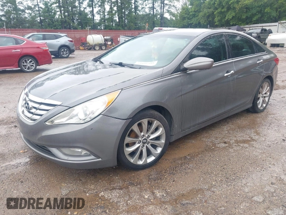 2012 Hyundai Sonata SE z VIN 5NPEC4AC7CH435022, wystawiony jako IAAI lot #42491555 z przebiegiem 176 670 mil mil oraz . Historia ofert i sprzedaży dostępna na DreamBid. Obrazek 2.