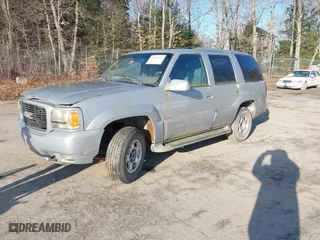 2000 GMC Denali with VIN 1GKEK13R7YR159609, listed as a IAAI auction lot 41828674 with 231,627 mi miles. Bid and sale history available at carsss.com. Image 2.