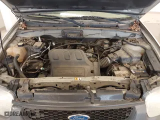 2004 Ford Escape XLT with VIN 1FMYU93164KB05521, listed as a IAAI auction lot 41723219 with 246,369 mi miles. Bid and sale history available at carsss.com. Image 10.