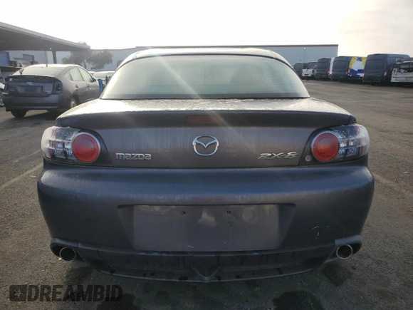 2006 Mazda RX-8 z VIN JM1FE173960204841, wystawiony jako Copart lot #85832354 z przebiegiem 129 871 mil mil oraz Czysty tytuł • Clean title. Historia ofert i sprzedaży dostępna na DreamBid. Obrazek 6.