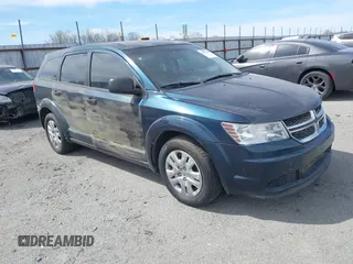 2014 Dodge Journey American Value Pkg with VIN 3C4PDCAB7ET101132, listed as a IAAI auction lot 41802381 with 101,895 mi miles. Bid and sale history available at carsss.com. Image 1.