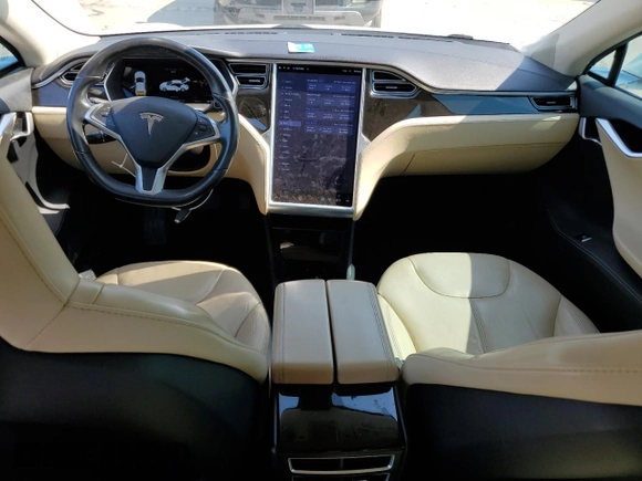 2014 Tesla Model S 60 с VIN 5YJSA1H16EFP45983, выставлен на аукционе Copart как лот 52256635 с пробегом 159 948 миль миль и Списание • Salvage title. История ставок и продаж доступна на DreamBid. Изображение 8.