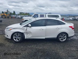 2014 Ford Focus Titanium with VIN 1FADP3J27EL142095, listed as a IAAI auction lot 42004419 with 139,515 mi miles. Bid and sale history available at carsss.com. Image 14.