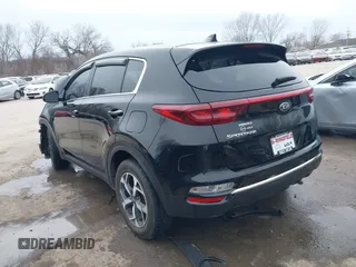 2021 Kia Sportage LX with VIN KNDPM3AC6M7858714, listed as a IAAI auction lot 41542186 with 140,617 mi miles. Bid and sale history available at carsss.com. Image 3.