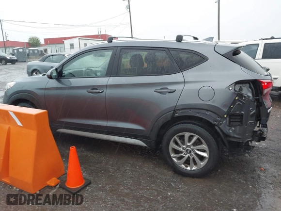 2018 Hyundai Tucson SEL with VIN KM8J3CA4XJU640429, listed as a IAAI auction lot 42063900 with 124,844 mi miles. Bid and sale history available at carsss.com. Image 14.