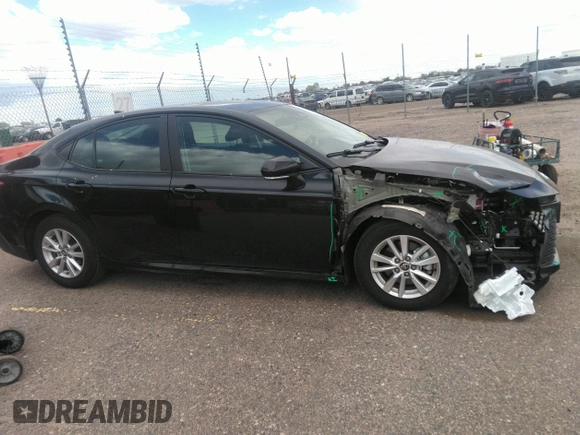 2025 Toyota Camry LE with VIN 4T1DAACK0SU509160, listed as a IAAI auction lot 42141098 with 17,028 mi miles and . Bid and sale history available at DreamBid. Image 14.
