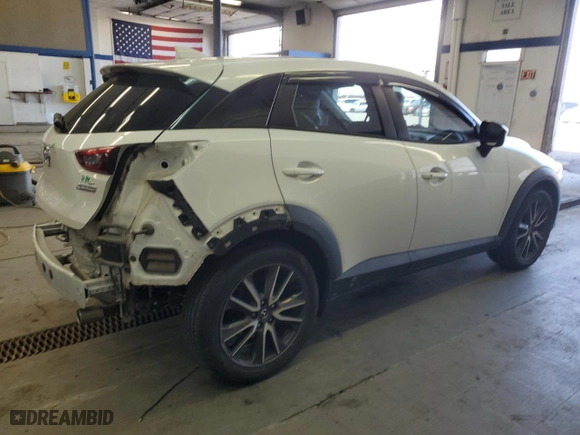 2017 Mazda CX-3 Touring with VIN JM1DKFC76H0148124, listed as a Copart auction lot 51866325 with 100,512 mi miles and Salvage Title. Bid and sale history available at carsss.com. Image 3.