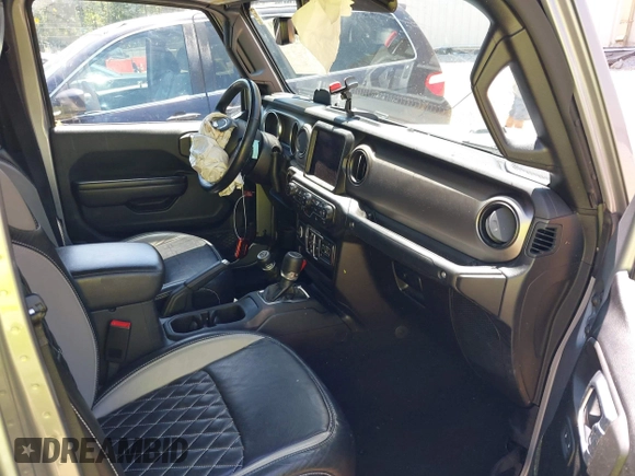 2021 Jeep Gladiator Willys z VIN 1C6HJTAG6ML507039, wystawiony jako IAAI lot #42057637 z przebiegiem 69 443 mil mil oraz . Historia ofert i sprzedaży dostępna na DreamBid. Obrazek 5.