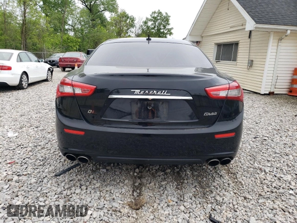 2014 Maserati Ghibli S Q4 with VIN ZAM57RTA8E1083877, listed as a Copart auction lot 57812725 with 94,088 mi miles and Clean title. Bid and sale history available at DreamBid. Image 6.