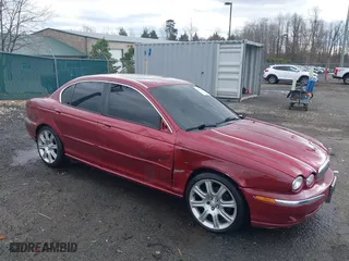 2005 Jaguar X-Type 3.0L with VIN SAJWA51A05WE55760, listed as a IAAI auction lot 41732516 with 192,630 mi miles. Bid and sale history available at carsss.com. Image 1.
