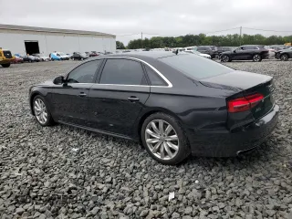 2016 Audi A8 Sport z VIN WAU43AFD2GN005719, wystawiony jako Copart lot #60746275 z przebiegiem 125 802 mil mil oraz Szkoda całkowita • Salvage title. Historia ofert i sprzedaży dostępna na DreamBid. Obrazek 2.