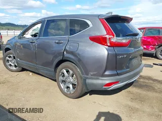 2018 Honda CR-V EX with VIN 2HKRW2H51JH664135, listed as a IAAI auction lot 42015075 with 94,996 mi miles. Bid and sale history available at carsss.com. Image 3.