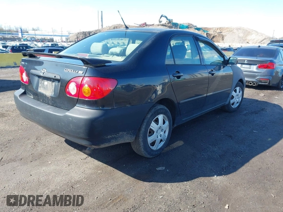 2007 Toyota Corolla CE with VIN JTDBR32E970109561, listed as a IAAI auction lot 41992222 with 199,407 mi miles. Bid and sale history available at carsss.com. Image 4.