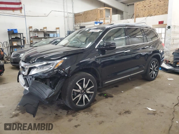 2019 Honda Pilot Touring 7-Passenger with VIN 5FNYF6H65KB092806, listed as a Copart auction lot 54205085 with 130,219 mi miles and Salvage title. Bid and sale history available at DreamBid. Image 1.