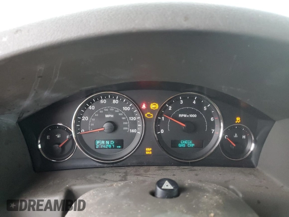 2006 Jeep Commander with VIN 1J8HH48NX6C125803, listed as a Copart auction lot 71247304 with 214,297 mi miles and Salvage Title. Bid and sale history available at carsss.com. Image 9.