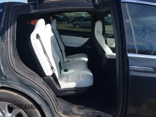 2018 Tesla Model X 75D with VIN 5YJXCDE44JF091690, listed as a IAAI auction lot 41585617 with 128,826 mi miles and . Bid and sale history available at DreamBid. Image 8.