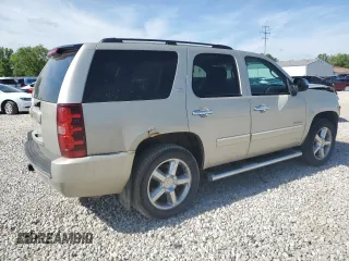 2014 Chevrolet Tahoe LTZ with VIN 1GNSKCE03ER201981, listed as a Copart auction lot 56421125 with 173,710 mi miles and Salvage title. Bid and sale history available at DreamBid. Image 3.